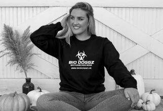 Young mother wearing a custom printed crew neck sweater with a business logo printed with direct to film printer